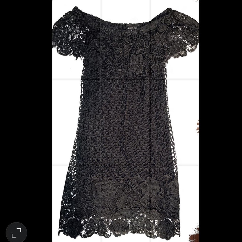 Beautiful black dress. Can wear on/off/across/shoulder. Large 10-12